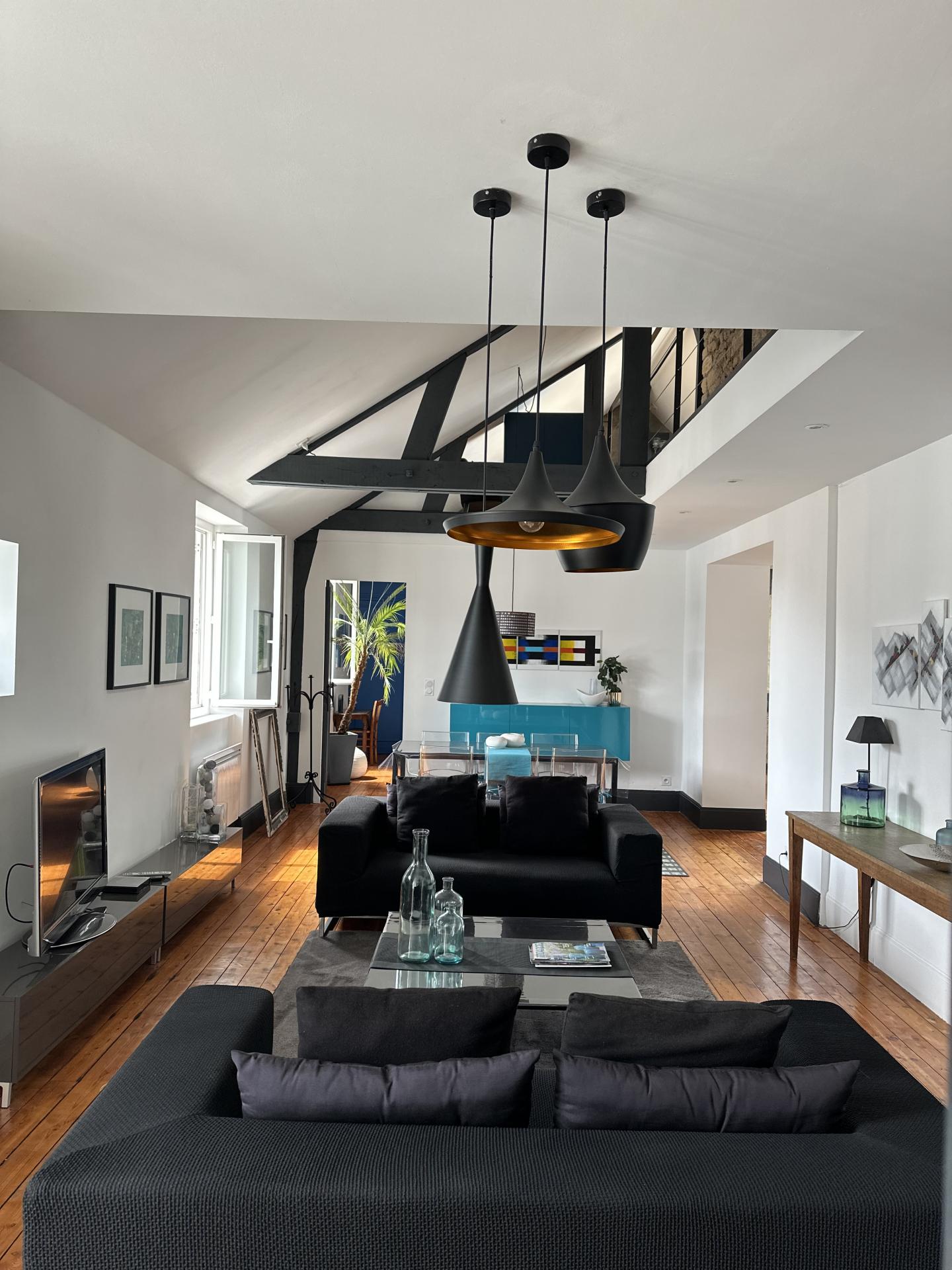 Loft d'exception – 145 m² au sol – Volumes spectaculaires – Charme industriel